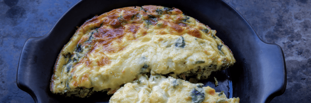 Frittata made of eggs bacon and spinach