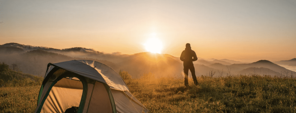 Person Standing Near Camping Tent