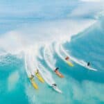 people surfing on sea waves