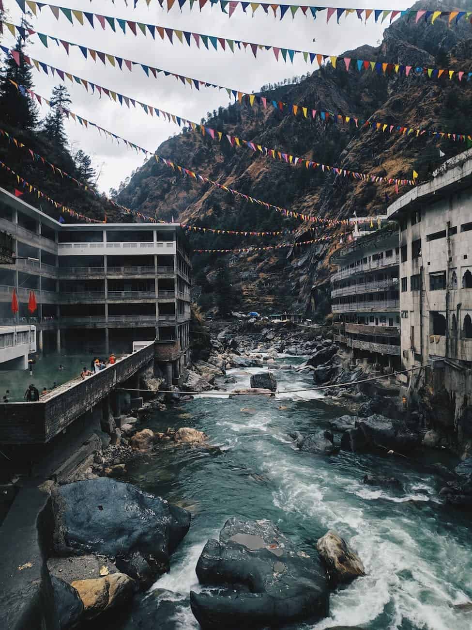 river between buildings