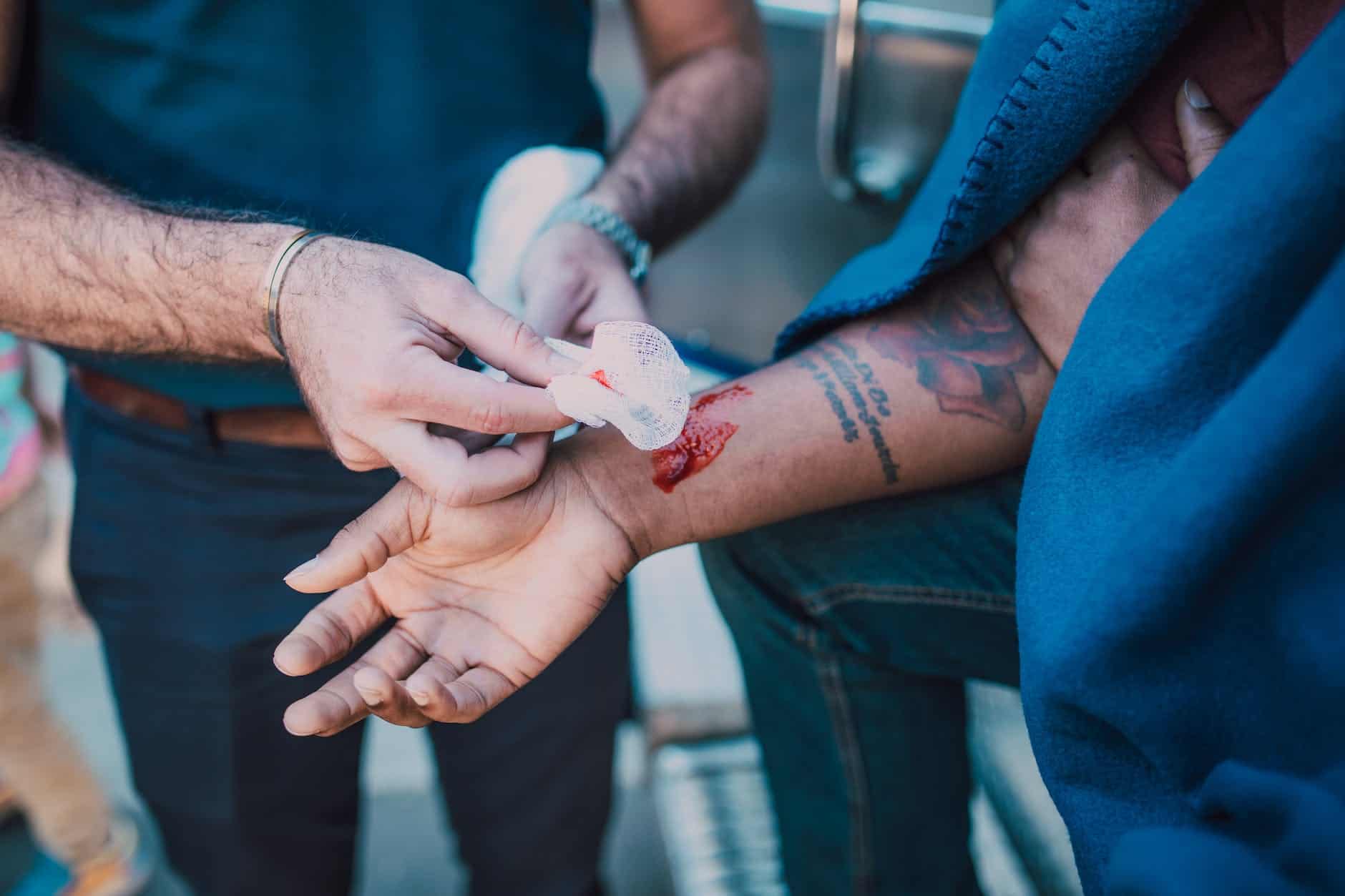 man administering first aid