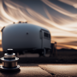 An image featuring a close-up of the underbelly of a camper, showcasing a sleek, cylindrical black tank with a visible pipe network, nestled amidst metal brackets, valves, and a sturdy drain plug
